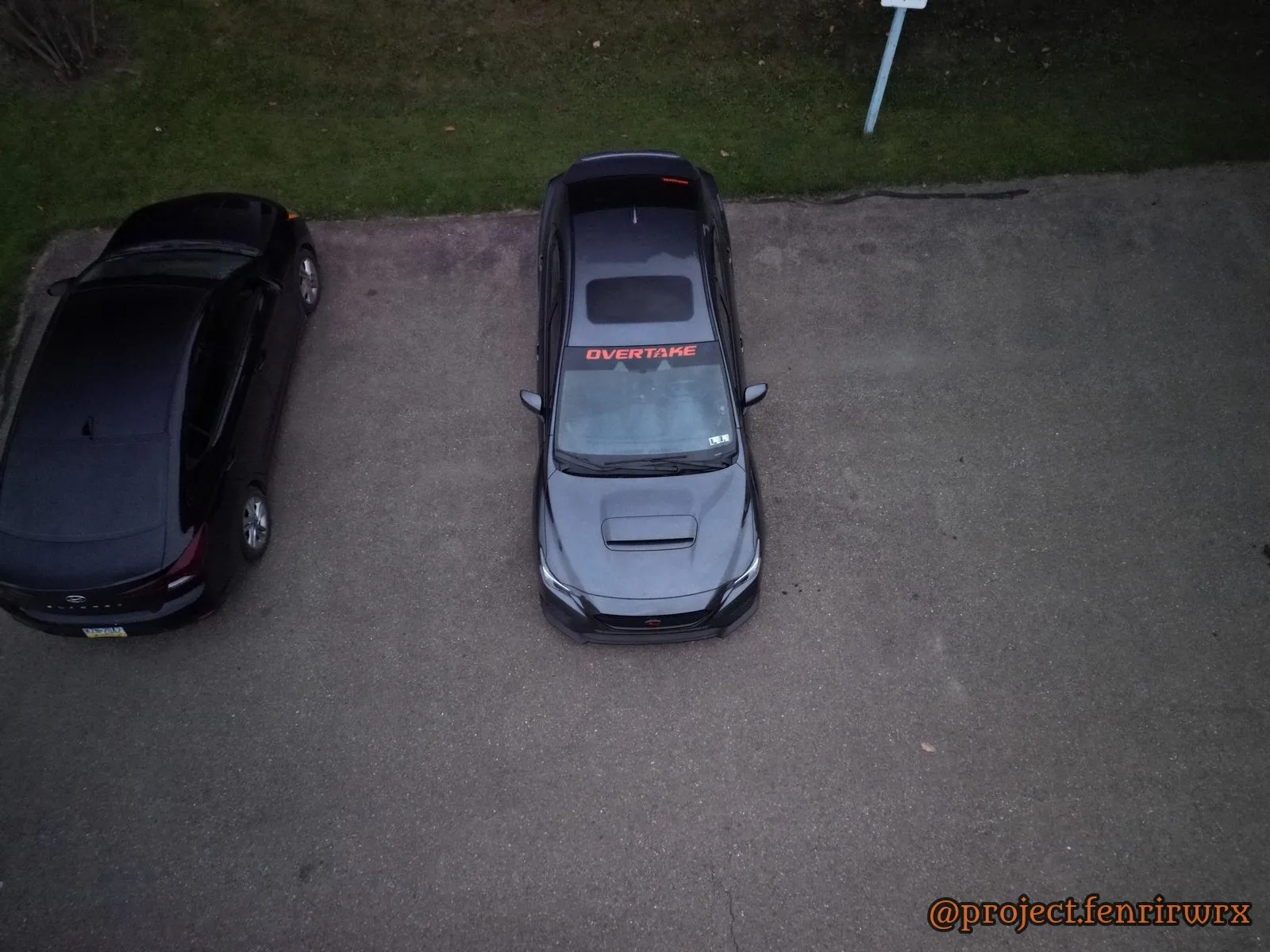 Straight down on the car and the Overtake banner