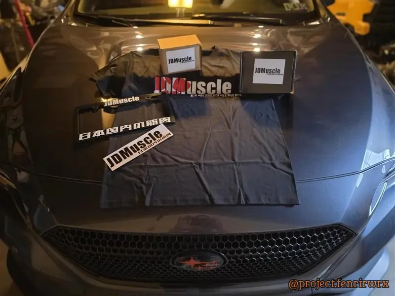 JDMuscle sponsor package on the hood: shirt, plate frame, banner and stickers