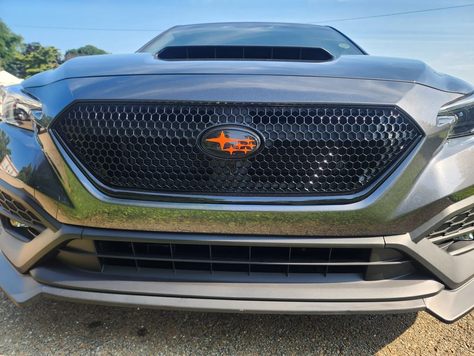 Orange SMY badge on the grille