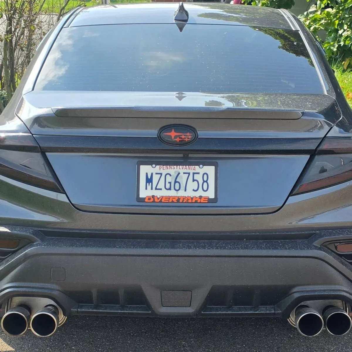 Rear of the car with quad tips