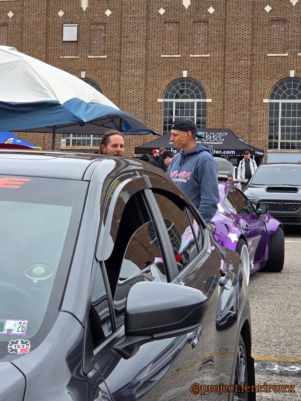 Talking cars beside Fenrir at Boxerfest