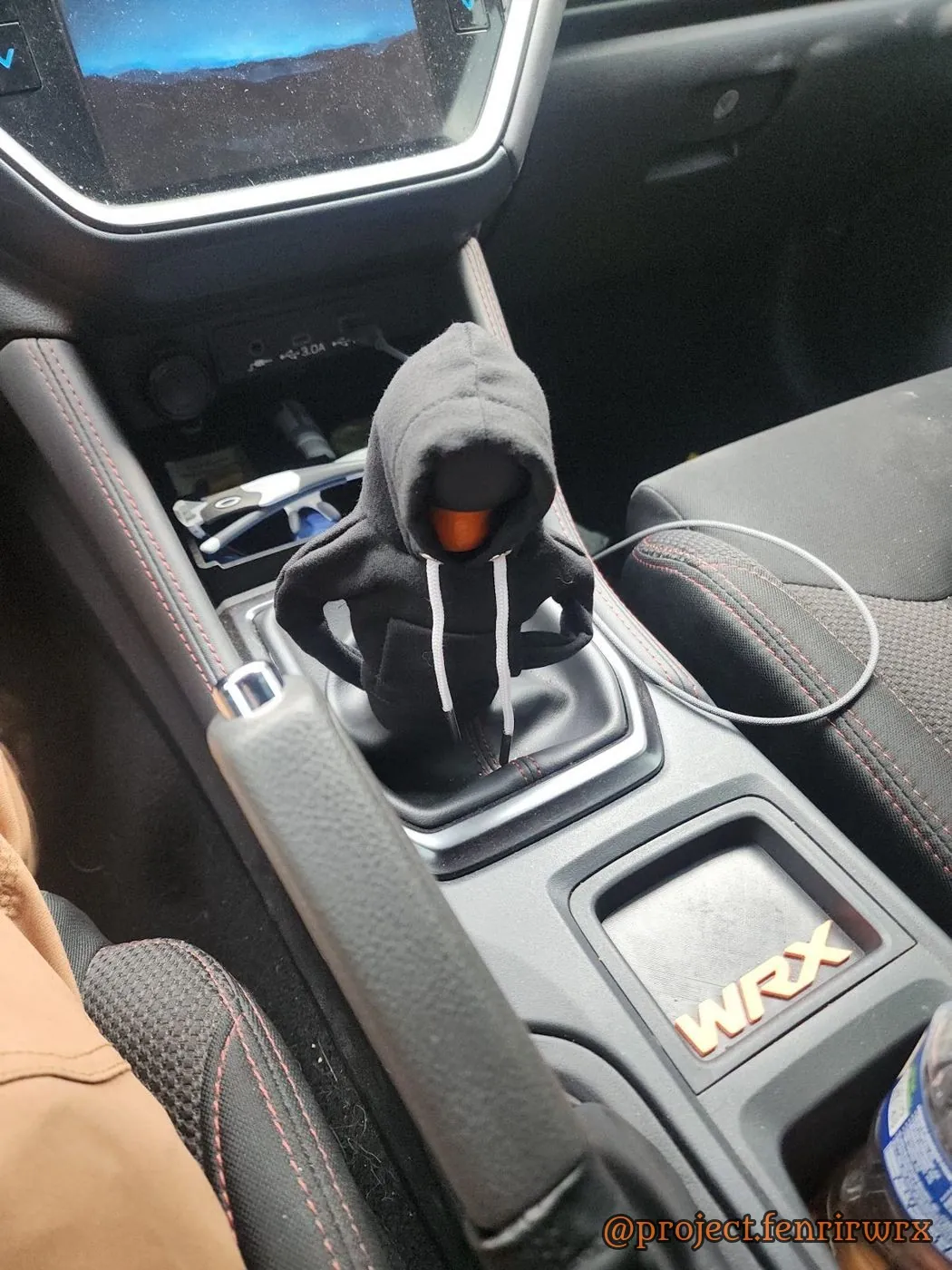 The knob in its hoodie