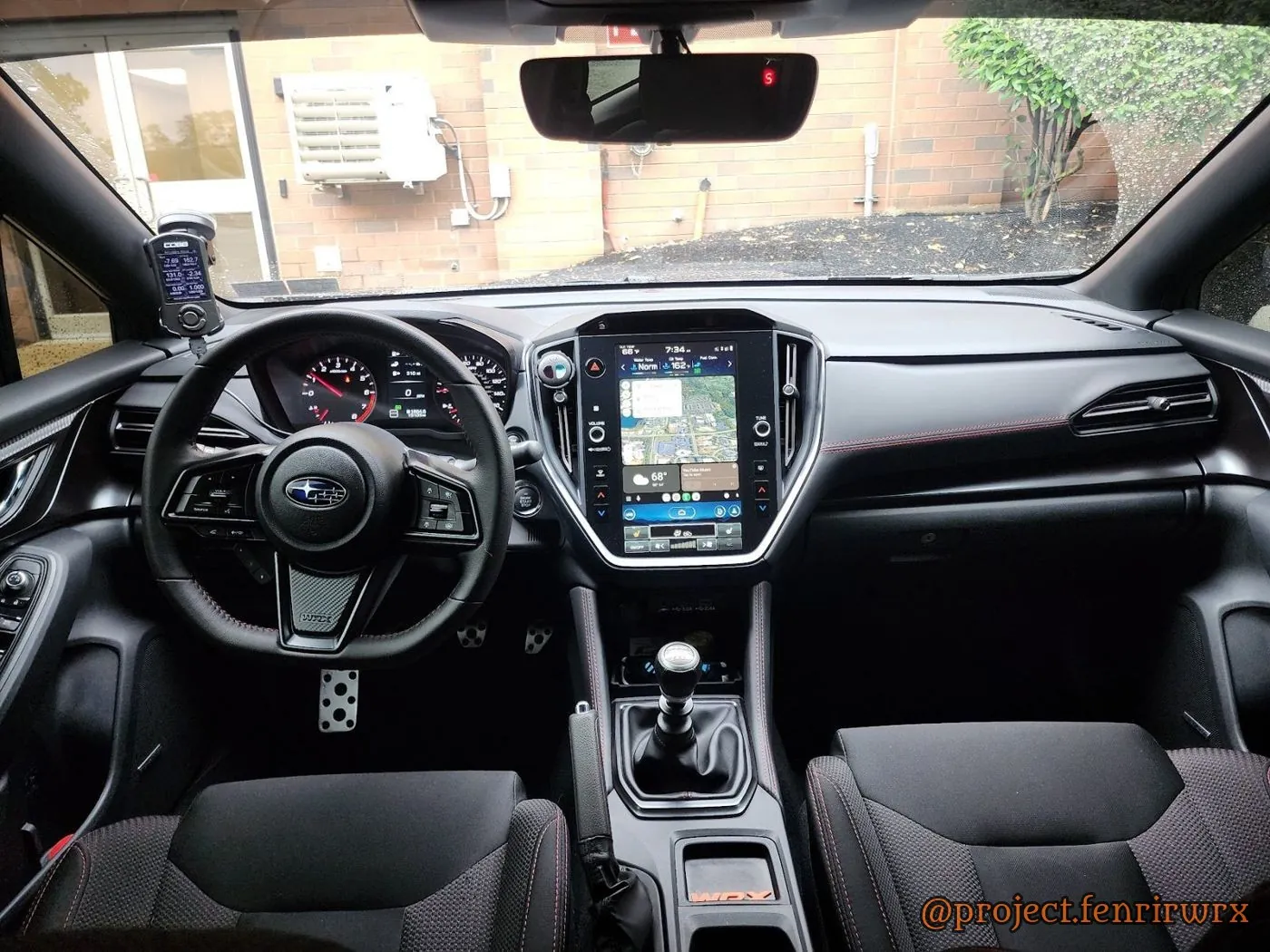 Full dash from the back seat