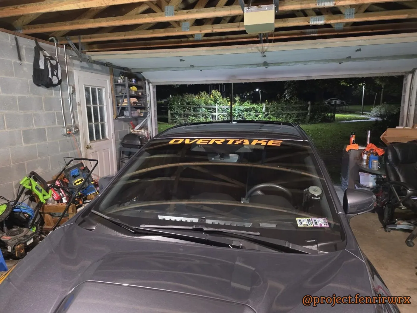 Overtake windshield banner in the garage