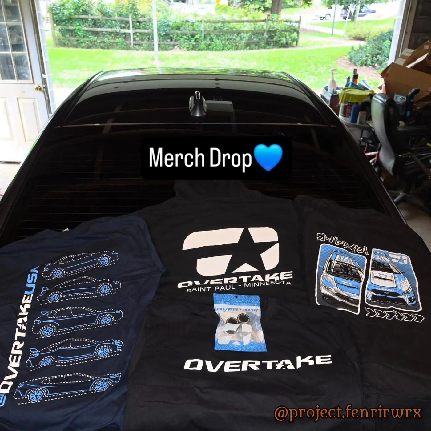 Overtake merch drop on the hood
