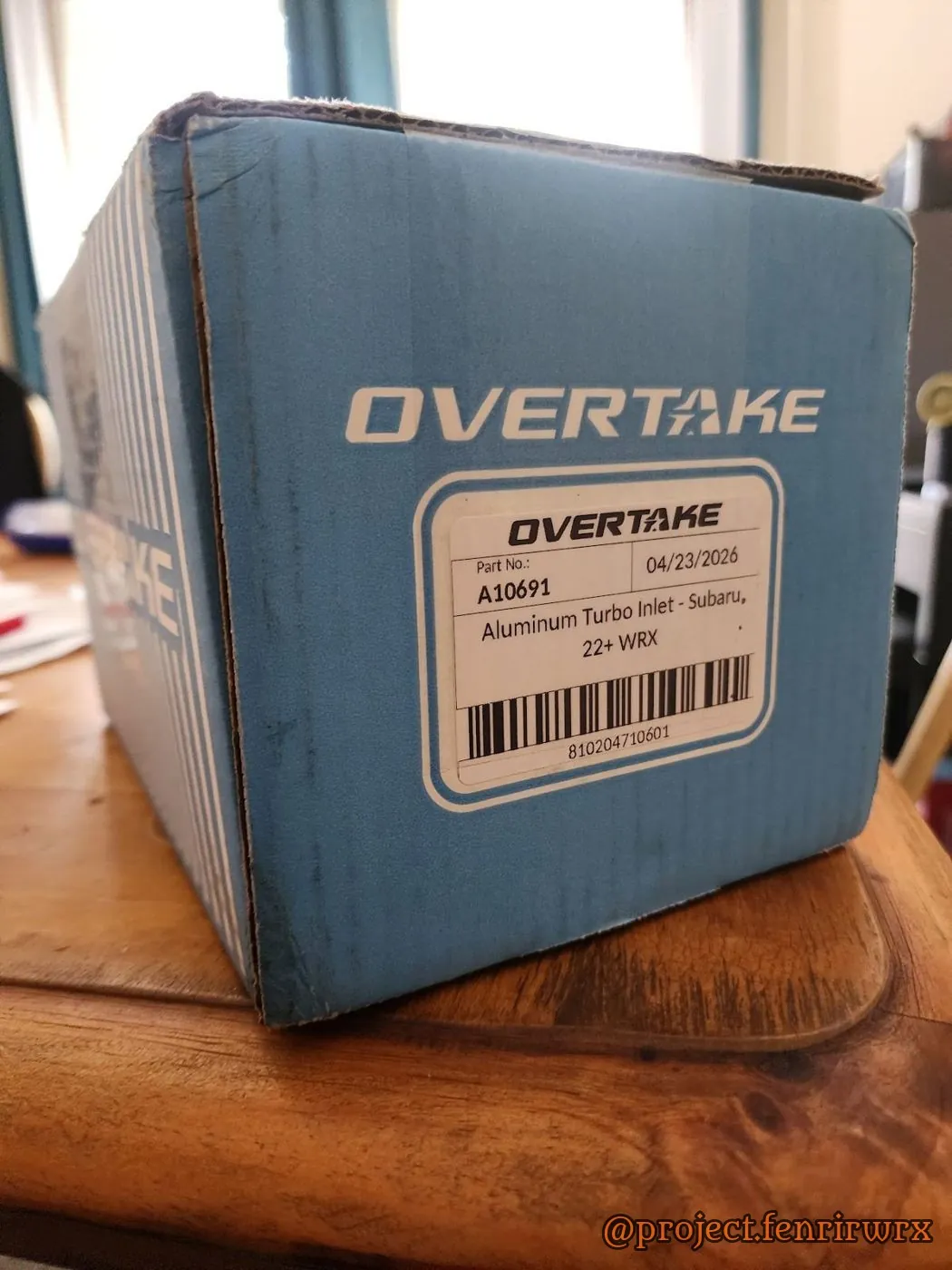 An Overtake box on the table