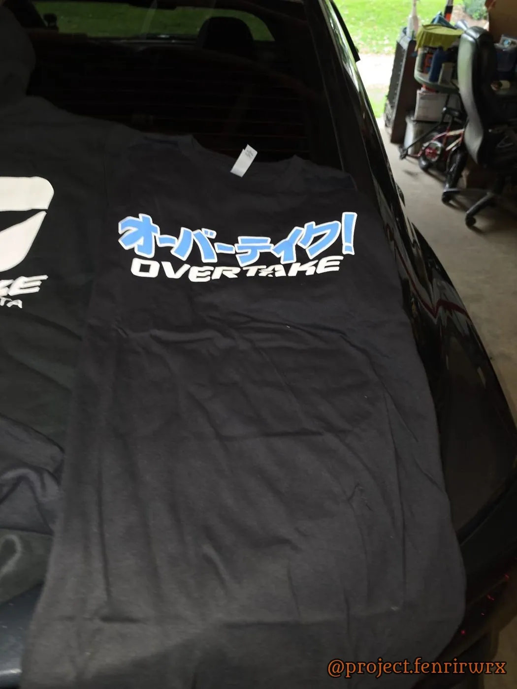 Overtake shirt on the hood