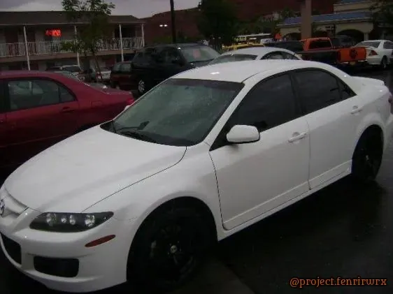 White Mazdaspeed6 Sport in the lot