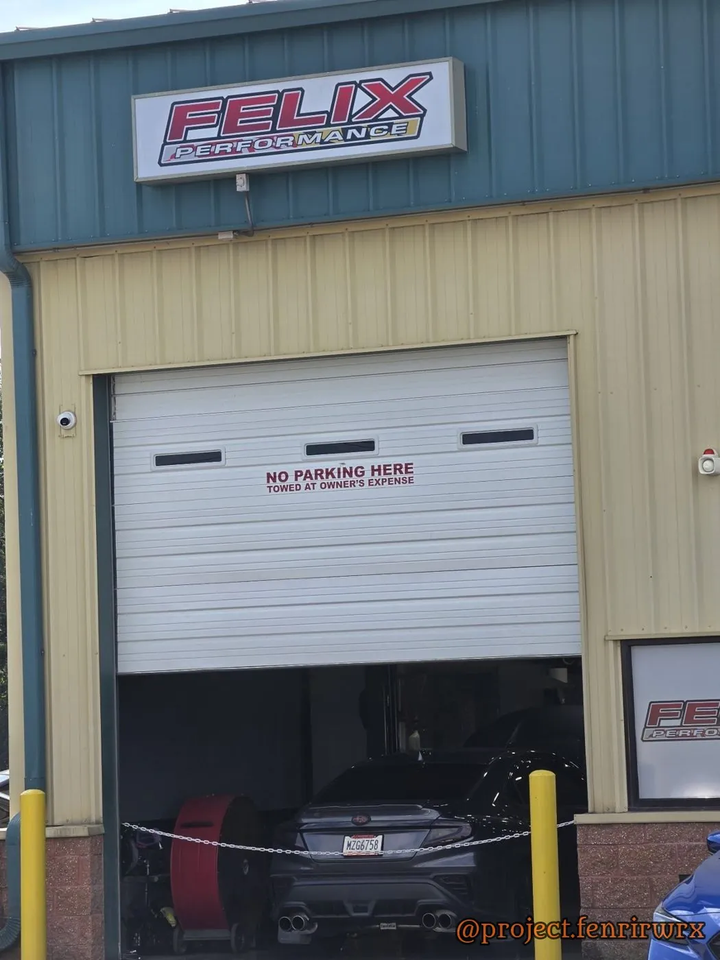 The bay door at Felix Performance