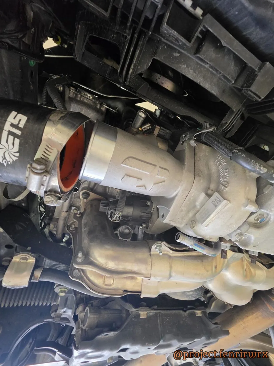 Overtake turbo inlet meeting the ETS piping, from below