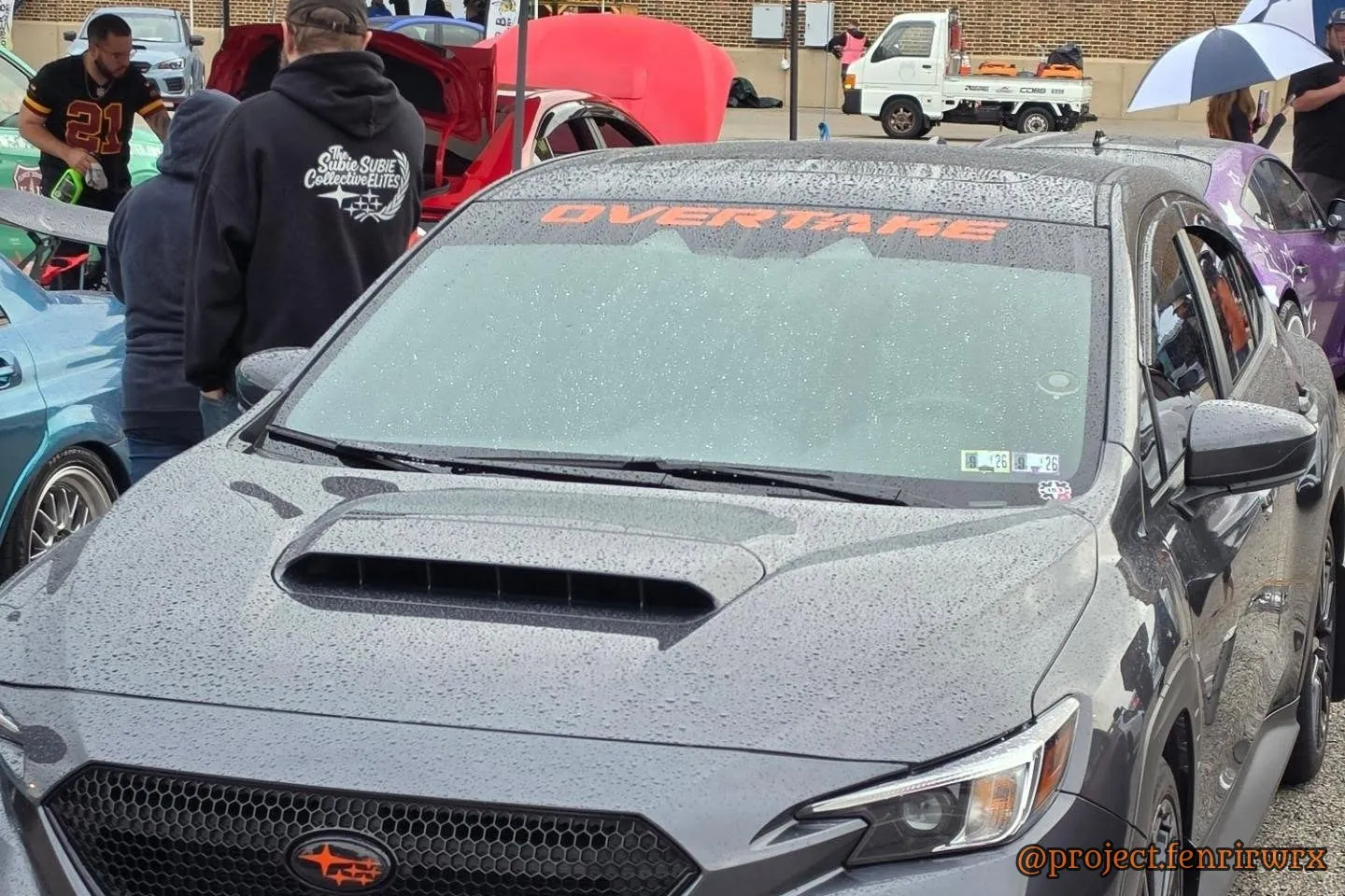 Boxerfest in the rain with the Overtake banner
