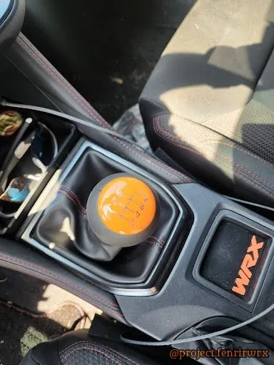 Orange shift knob close-up
