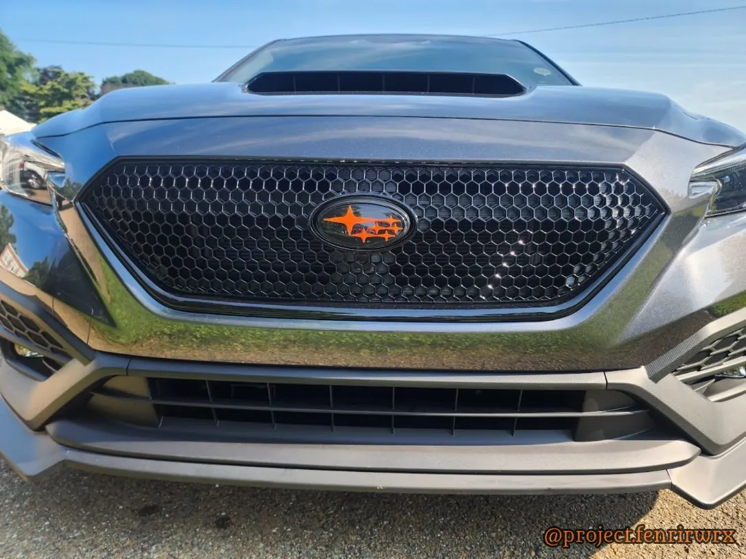 Sport grille with the orange star badge