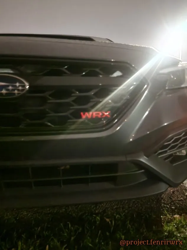 Stock grille with the red WRX badge