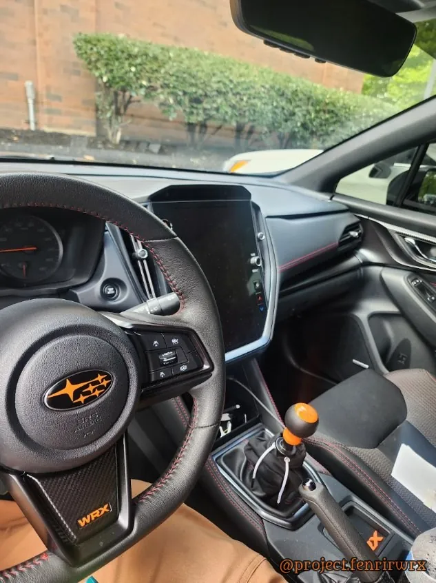 Orange steering wheel overlays and knob