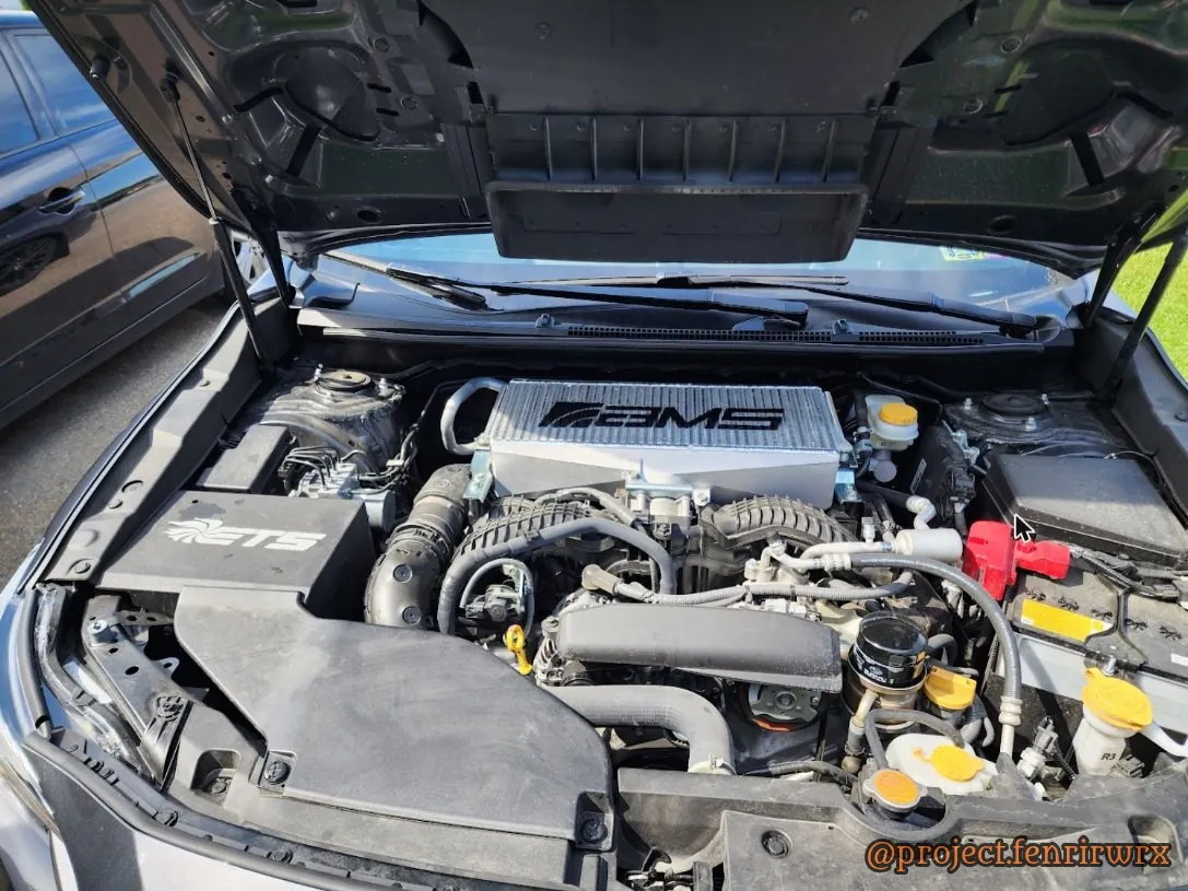 The AMS top-mount intercooler on, next to the ETS intake