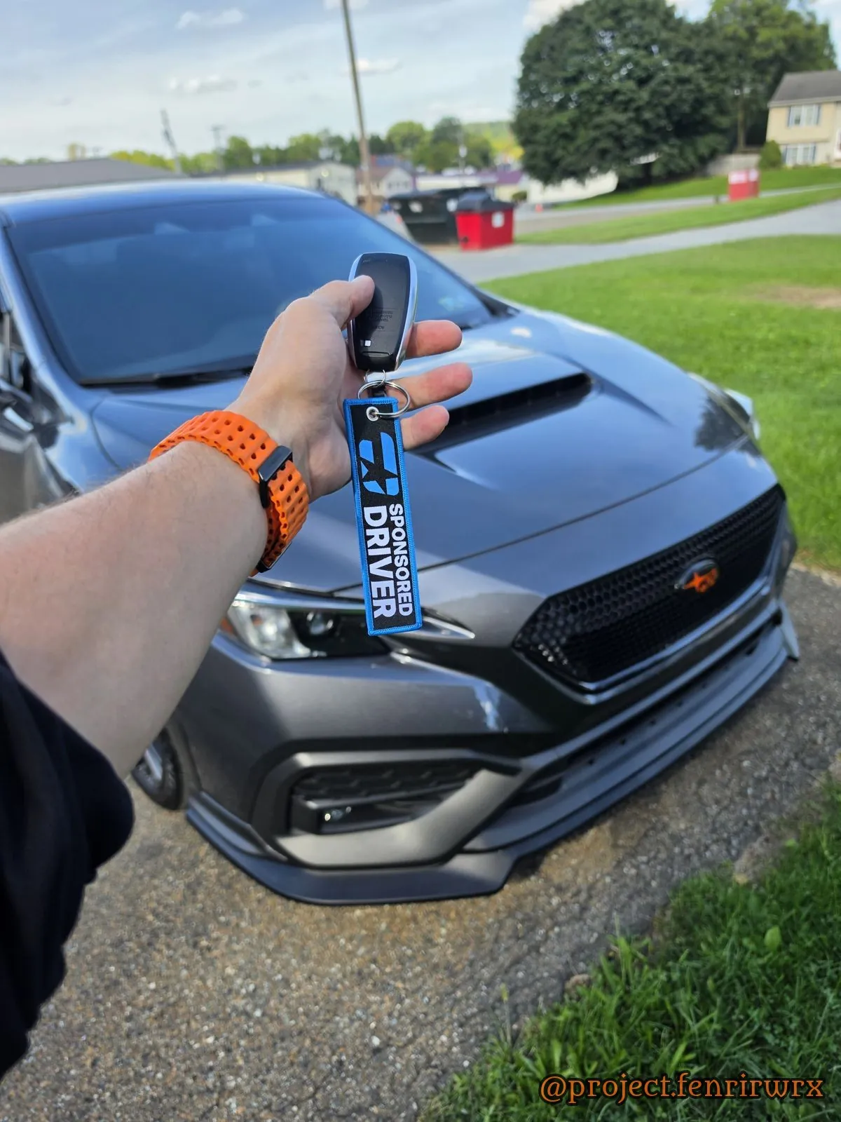 Keys with the Overtake sponsored driver tag