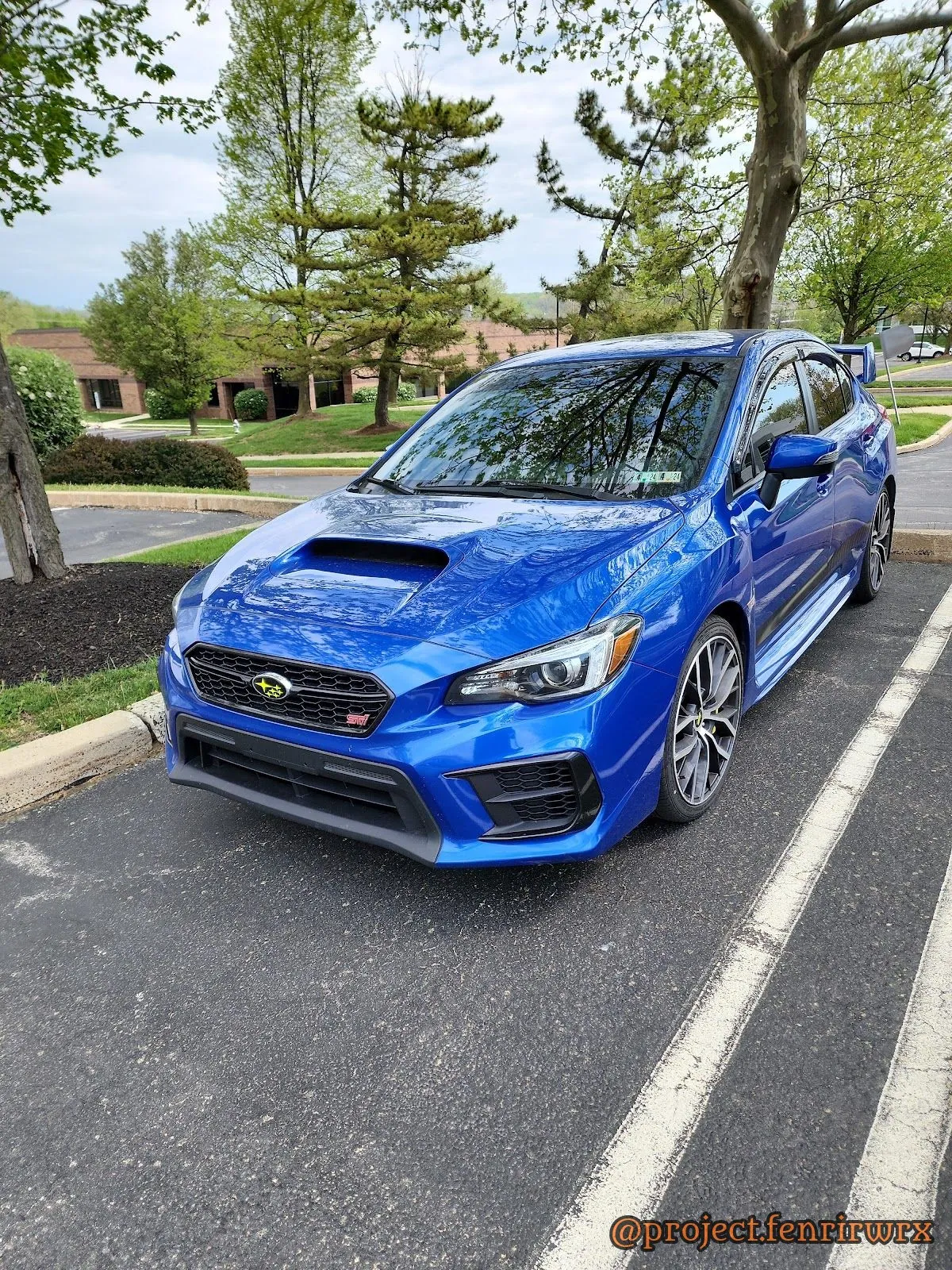 Blue 2020 WRX STI, front three-quarter