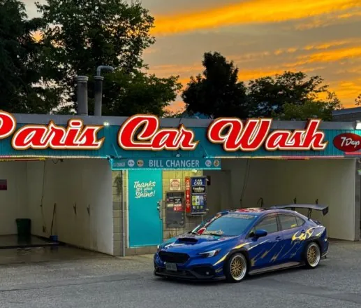 @kiarae.c's WRX at a car wash at sunset